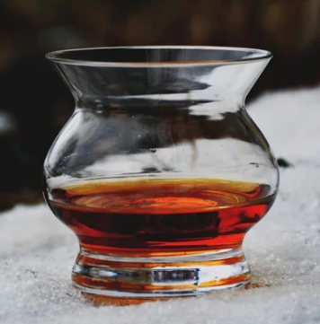 The actual NEAT glass — its outward-flaring rim