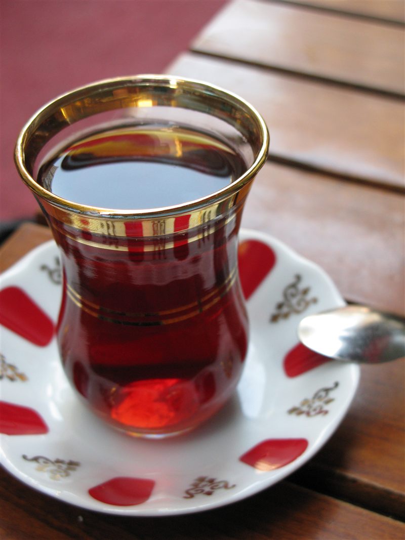 Dark red tea in a waisted Turkish tea glass