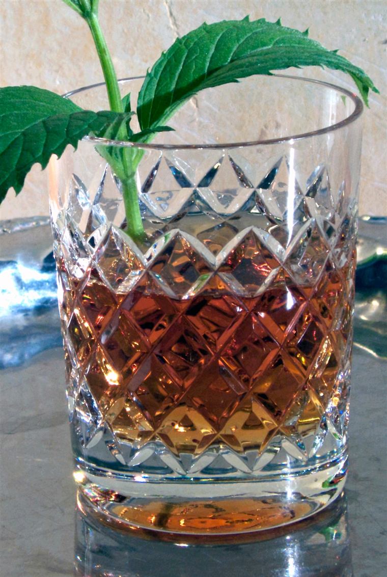 Whisky in a heavy cut-crystal tumbler